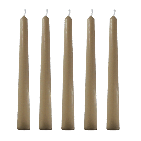 a group of candles on a black background