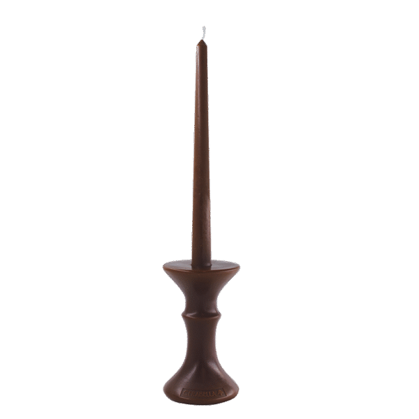 a brown candle in a stand